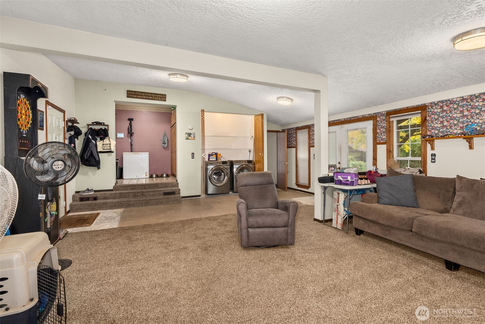 535 Southwest 19th Street Chehalis, WA 98532 - Photo 15 of 35 a living room with furniture and a gym machine