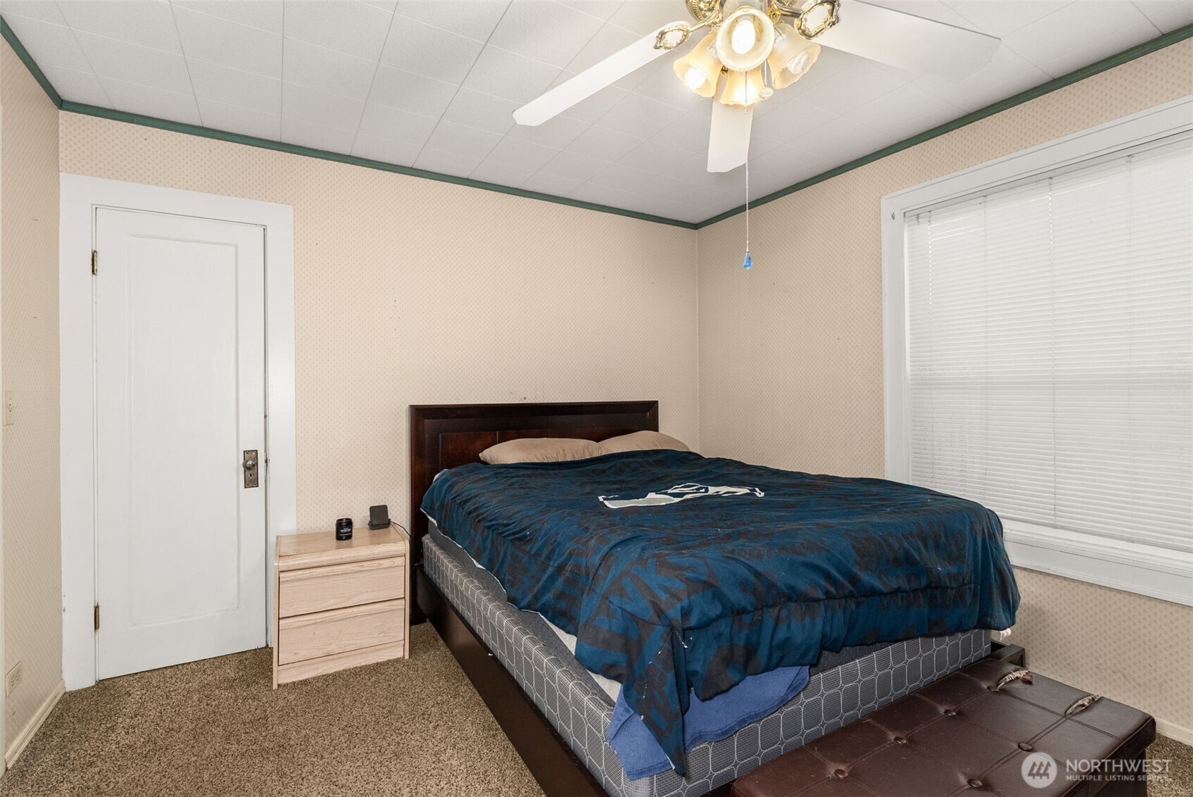 535 Southwest 19th Street Chehalis, WA 98532 - Photo 20 of 35 a bedroom with a bed and a chandelier
