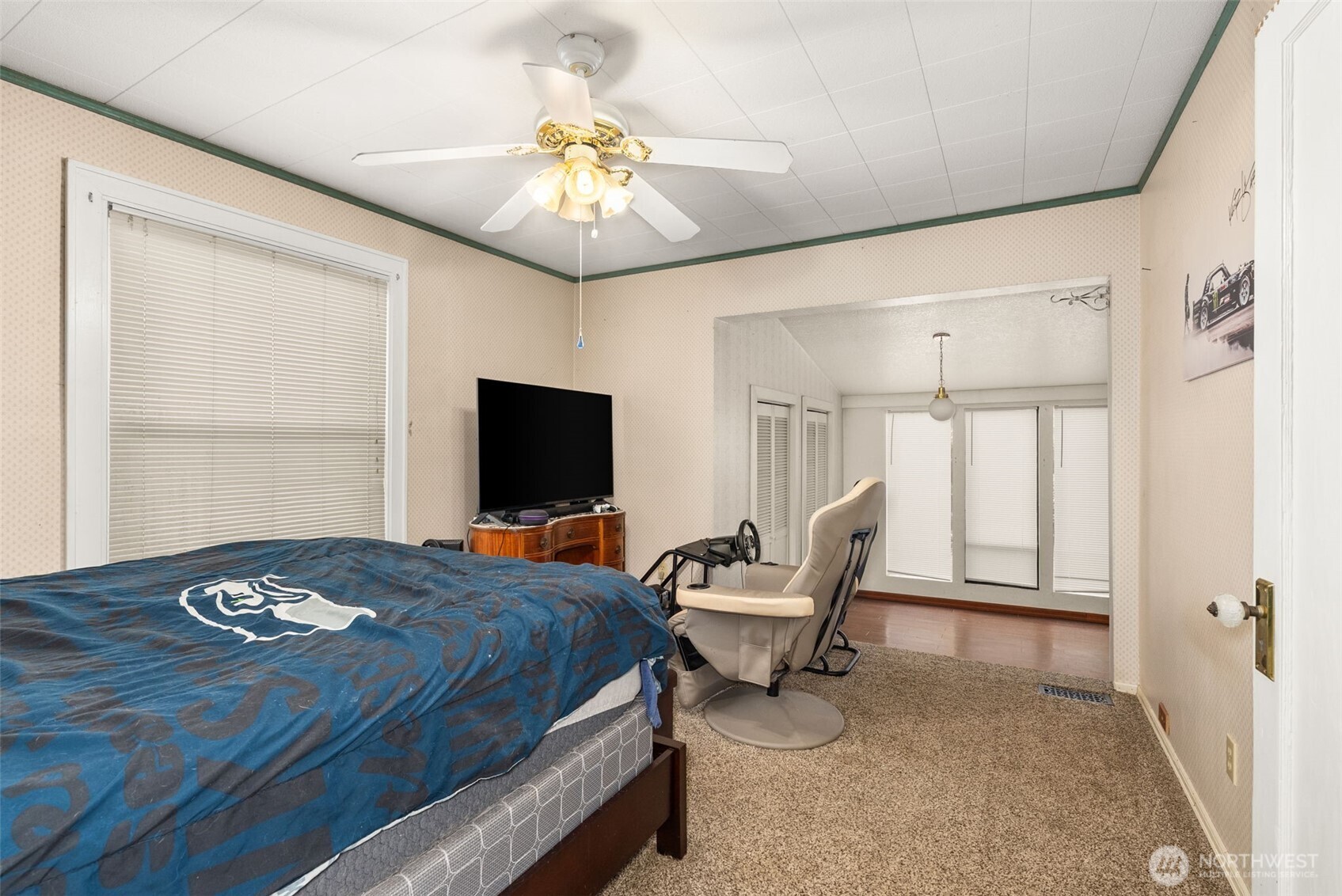 535 Southwest 19th Street Chehalis, WA 98532 - Photo 21 of 35 a bedroom with a bed and a chandelier