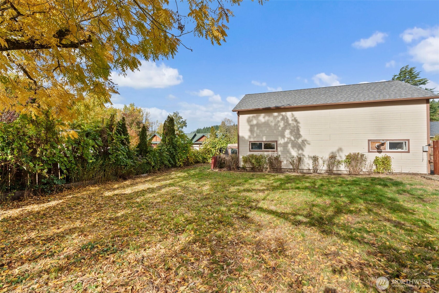 535 Southwest 19th Street Chehalis, WA 98532 - Photo 30 of 35 a view of a big yard next to a building