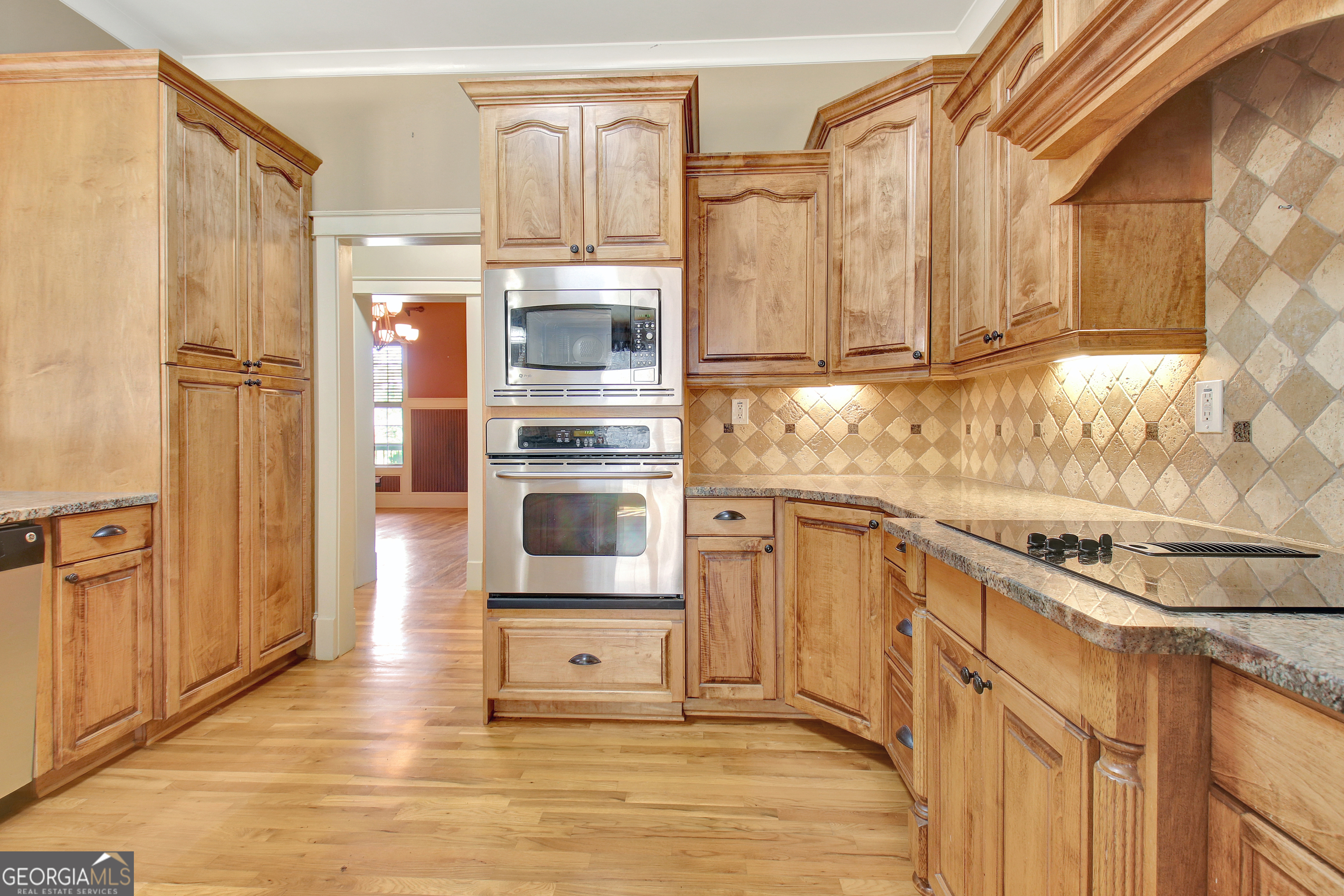 373 Blanton Mill Road Williamson, GA 30292 - Photo 14 of 57 a kitchen with stainless steel appliances a refrigerator and stove