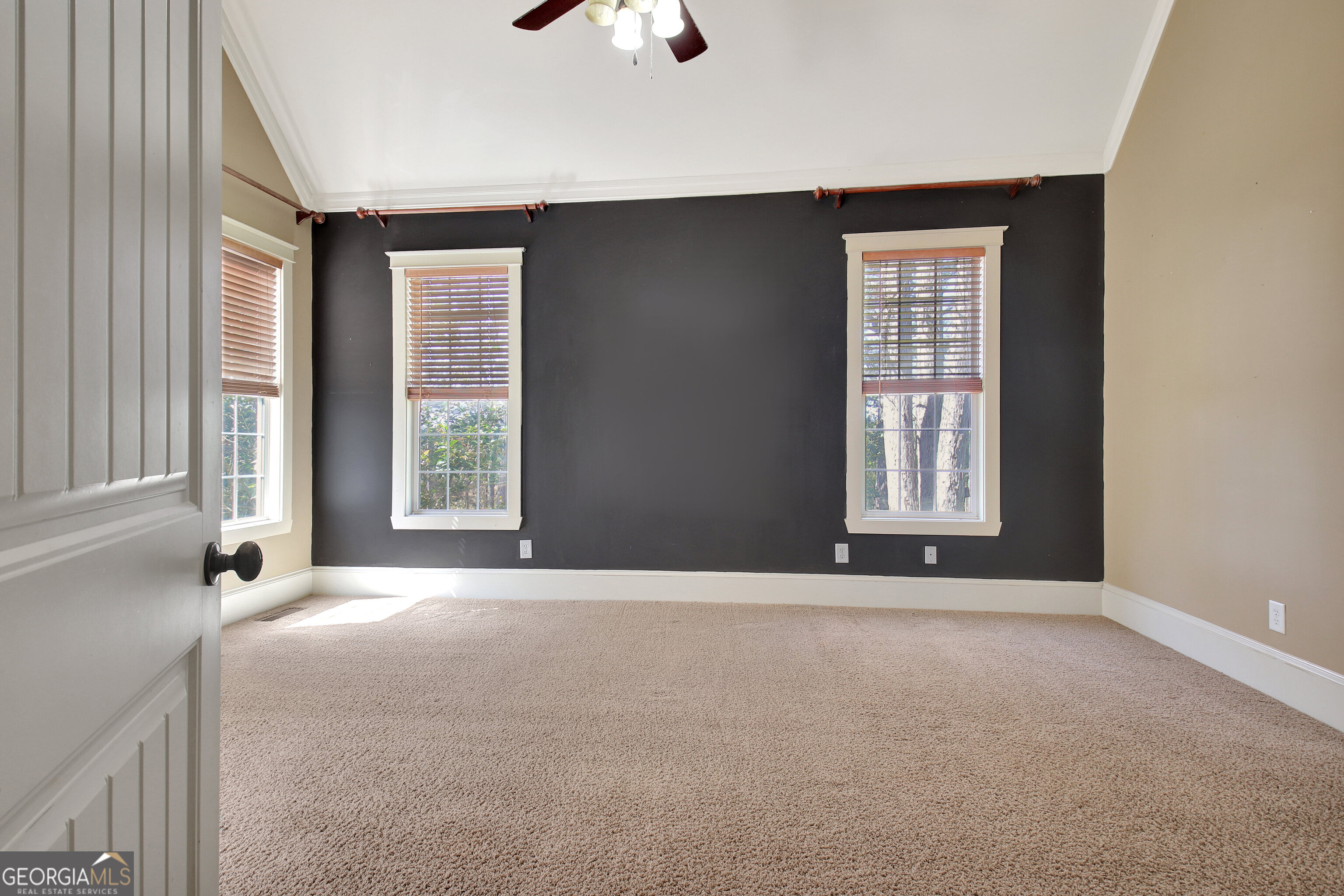 373 Blanton Mill Road Williamson, GA 30292 - Photo 20 of 57 a view of an empty room with a window