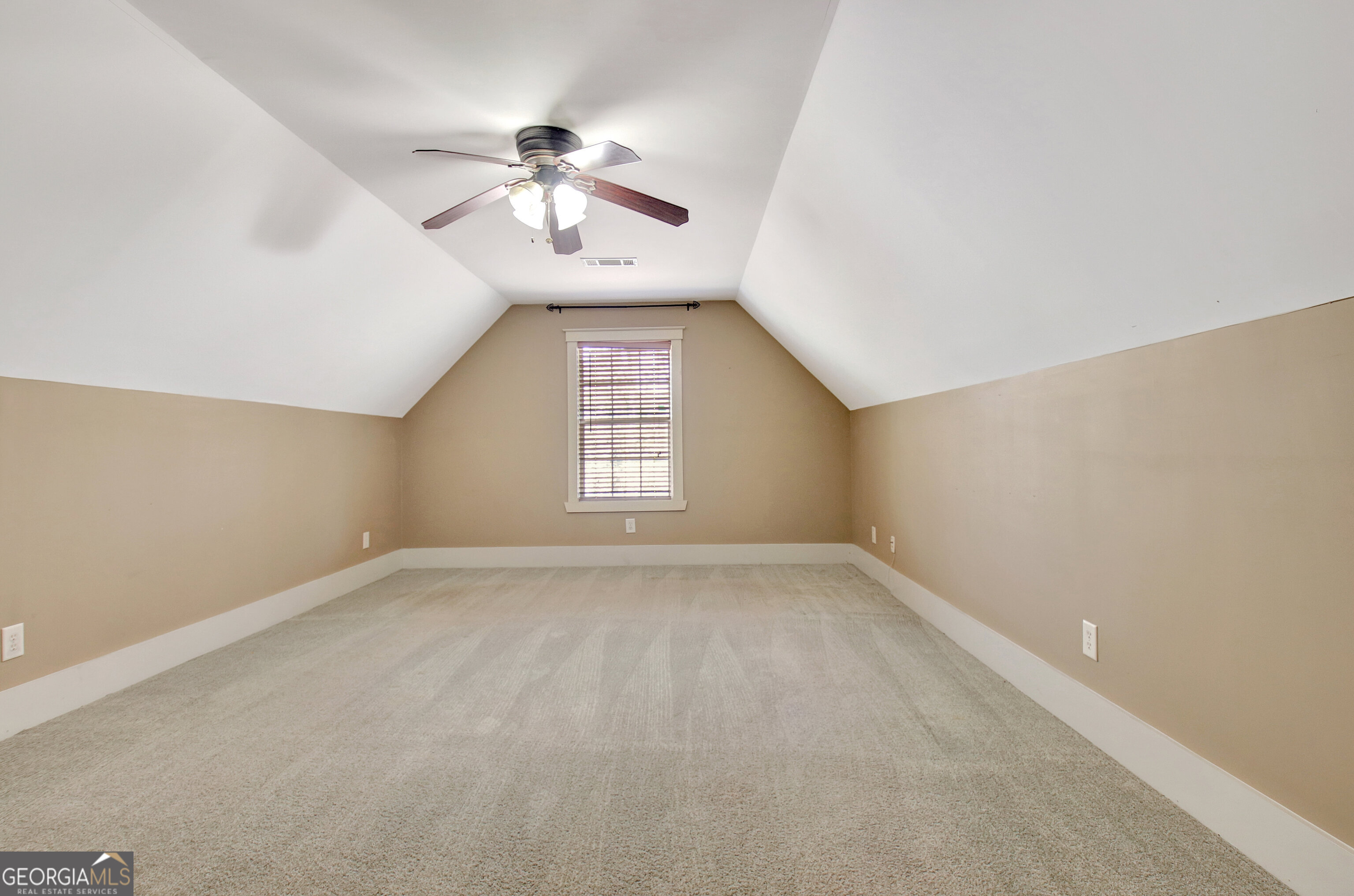 373 Blanton Mill Road Williamson, GA 30292 - Photo 34 of 57 wooden floor in an empty room with a window