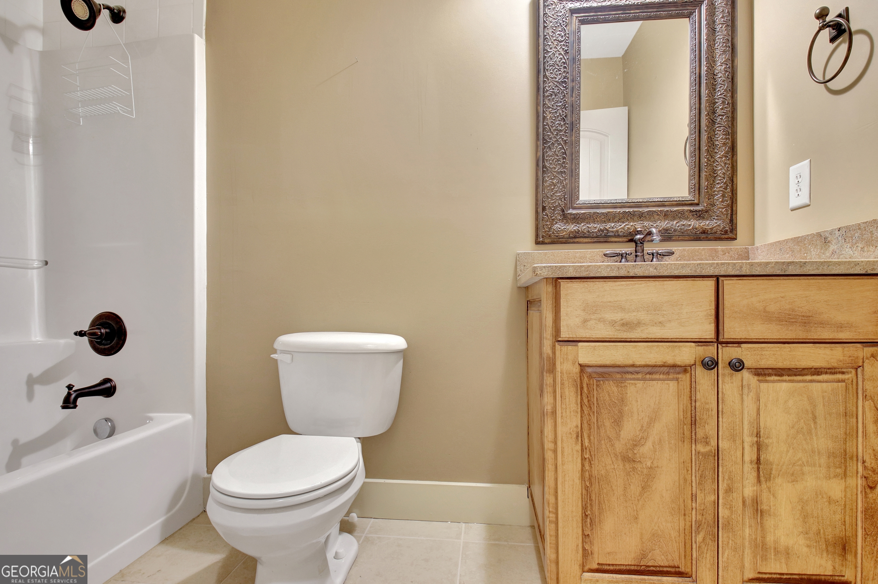 373 Blanton Mill Road Williamson, GA 30292 - Photo 36 of 57 a bathroom with a toilet a sink and a bathtub
