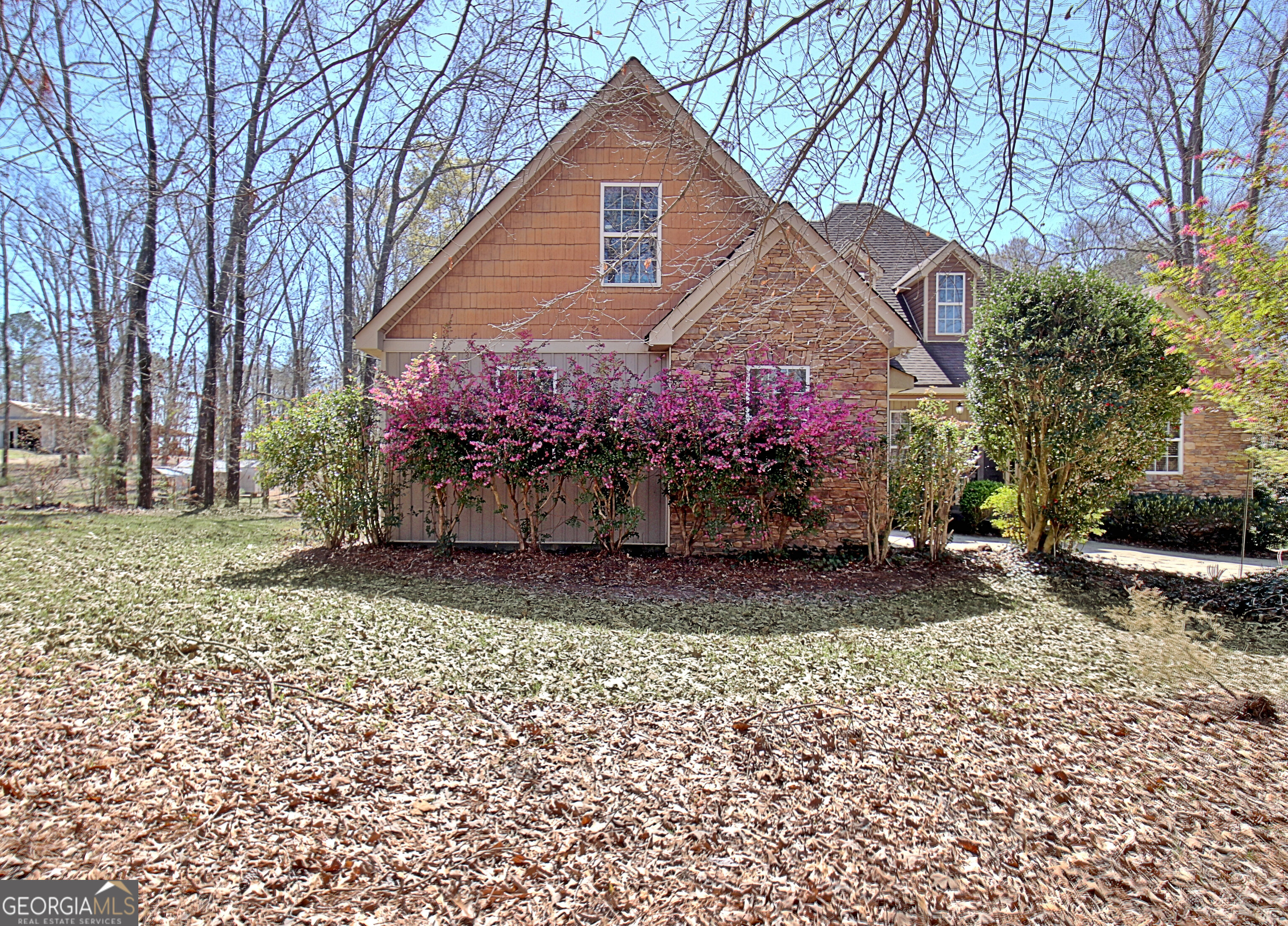 373 Blanton Mill Road Williamson, GA 30292 - Photo 5 of 57 a front view of a house with a yard