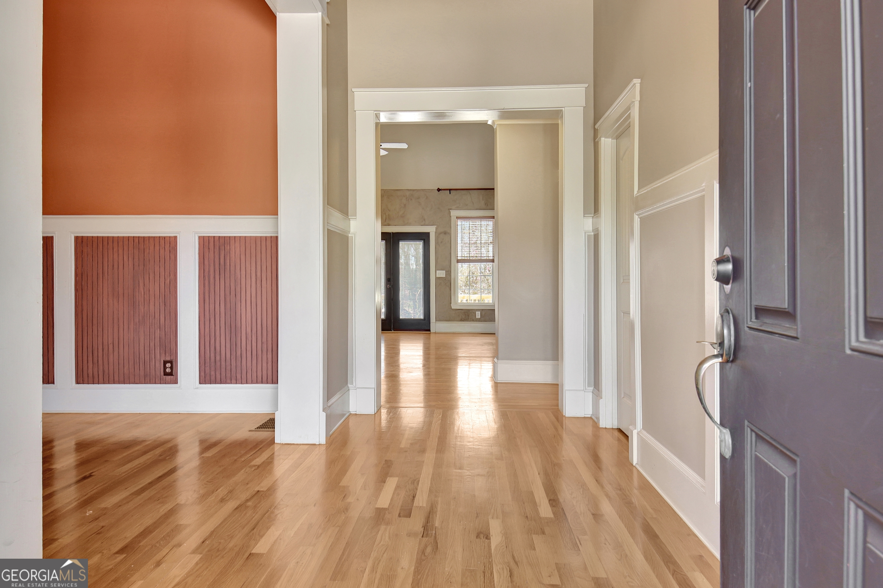 373 Blanton Mill Road Williamson, GA 30292 - Photo 7 of 57 a view of a hallway with wooden floor and staircase