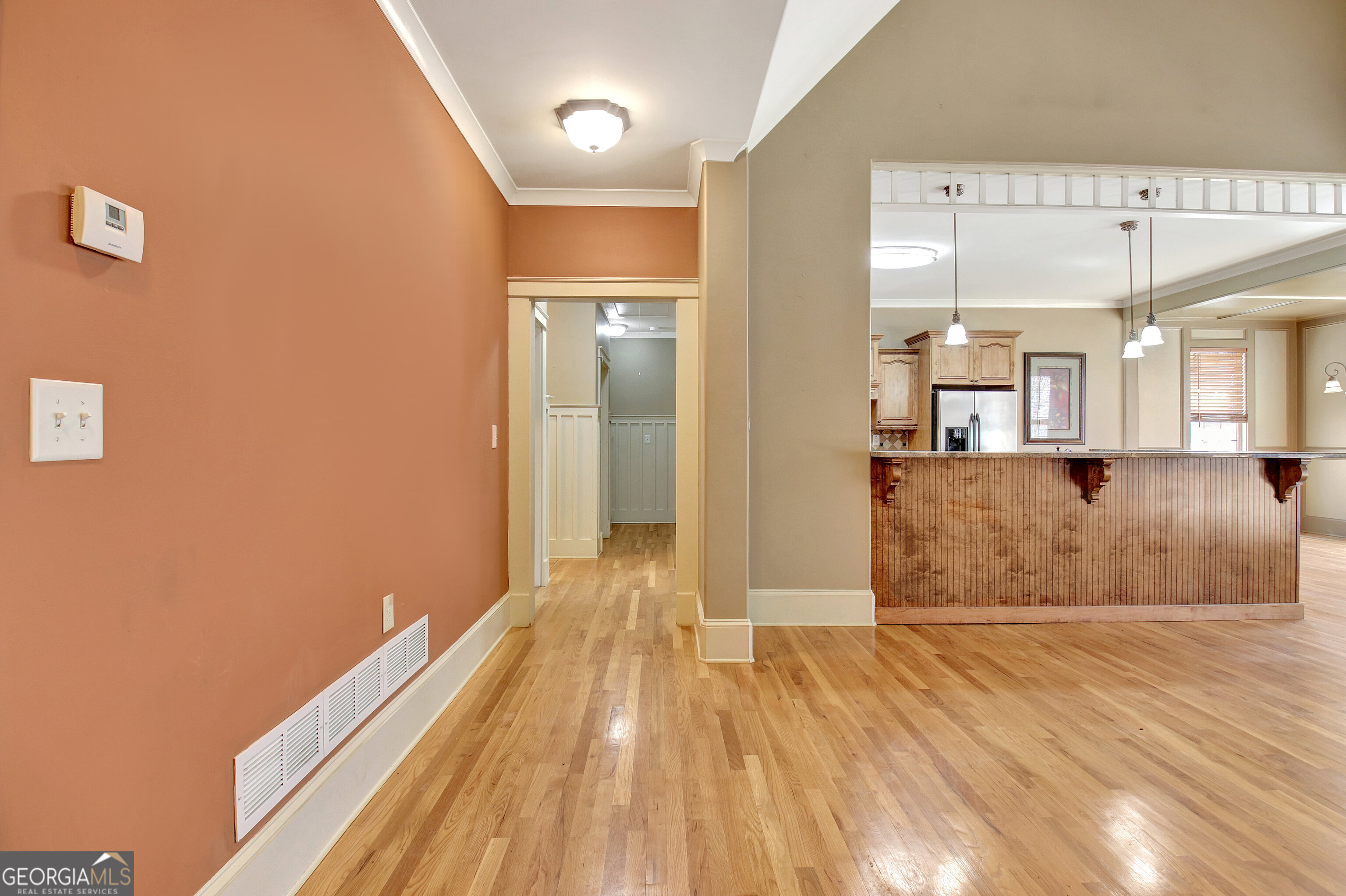 373 Blanton Mill Road Williamson, GA 30292 - Photo 10 of 57 a view of a big room with wooden floor and a bathroom