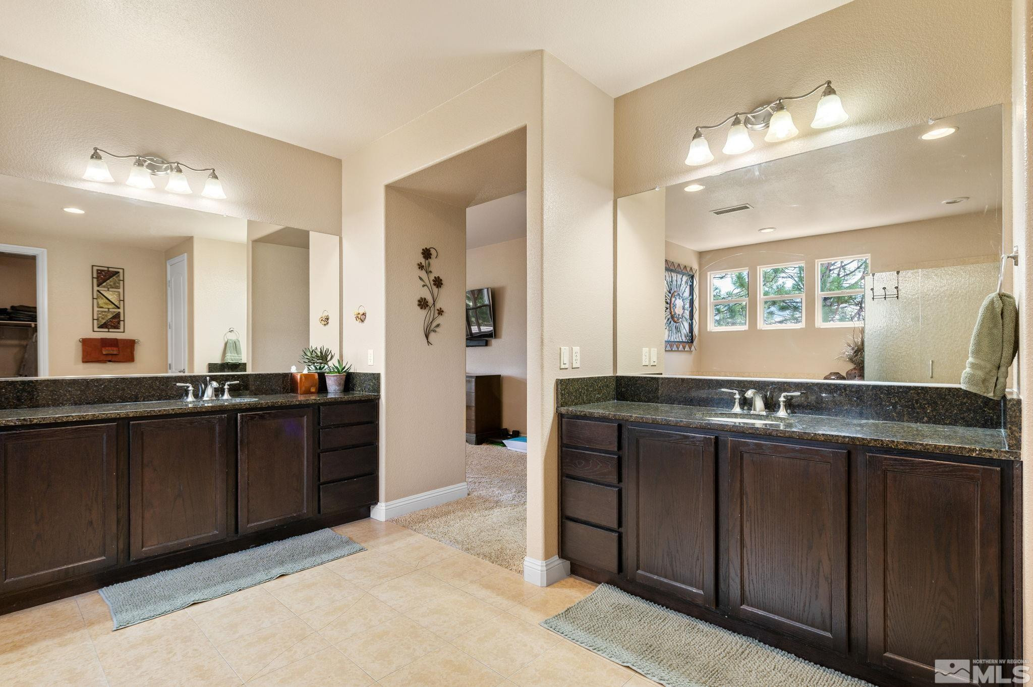 2055 Back Nine Trail Reno, NV 89523 - Photo 21 of 40 a large bathroom with a large tub and sink