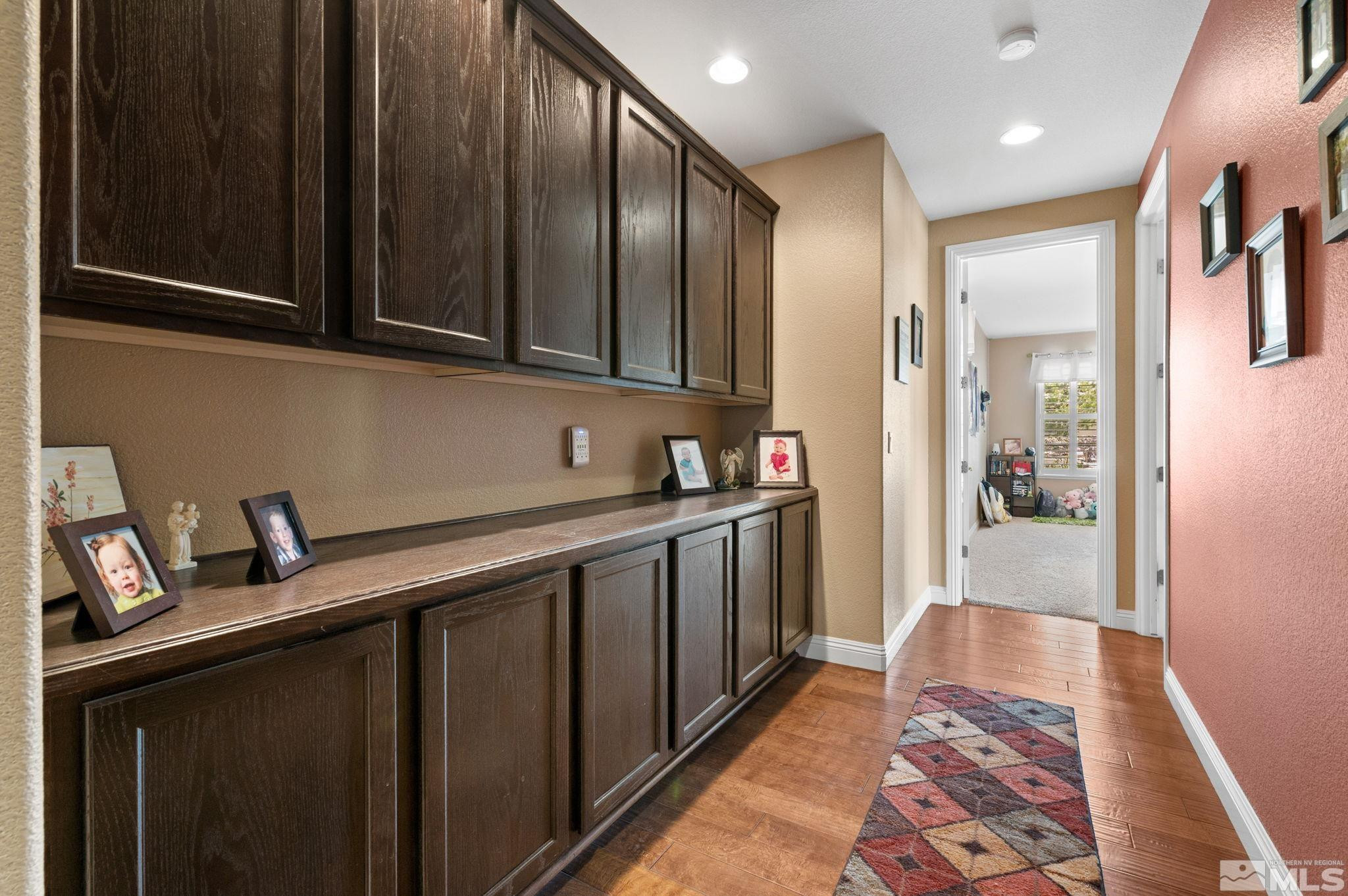2055 Back Nine Trail Reno, NV 89523 - Photo 25 of 40 a kitchen with granite countertop stainless steel appliances a sink and cabinets