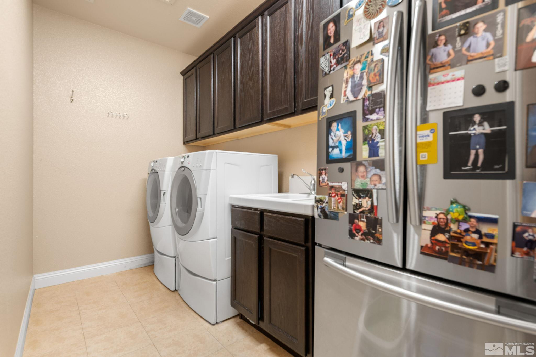 2055 Back Nine Trail Reno, NV 89523 - Photo 34 of 40 a utility room with dryer and washer