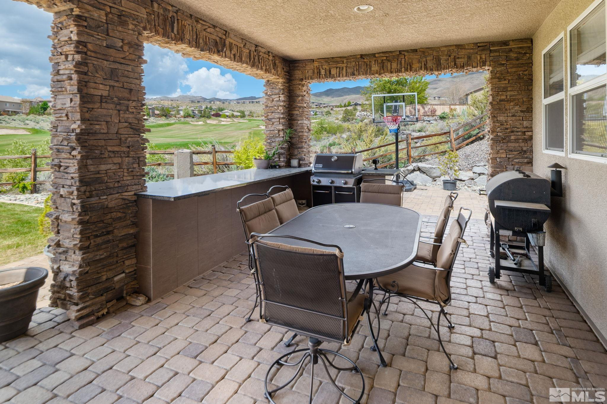 2055 Back Nine Trail Reno, NV 89523 - Photo 36 of 40 a view of a dining room with furniture window and outside view
