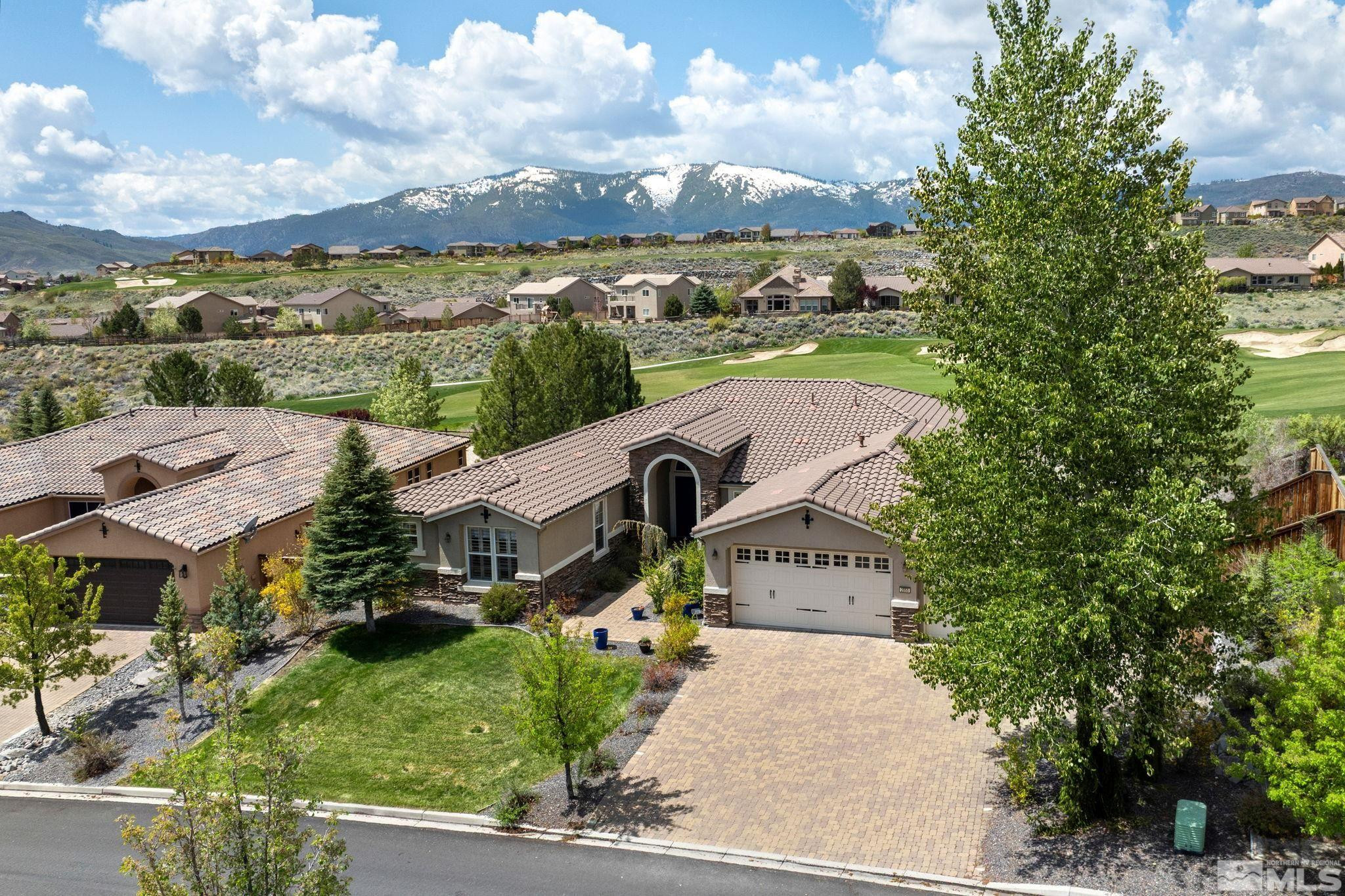 2055 Back Nine Trail Reno, NV 89523 - Photo 4 of 40 an aerial view of a house with a garden