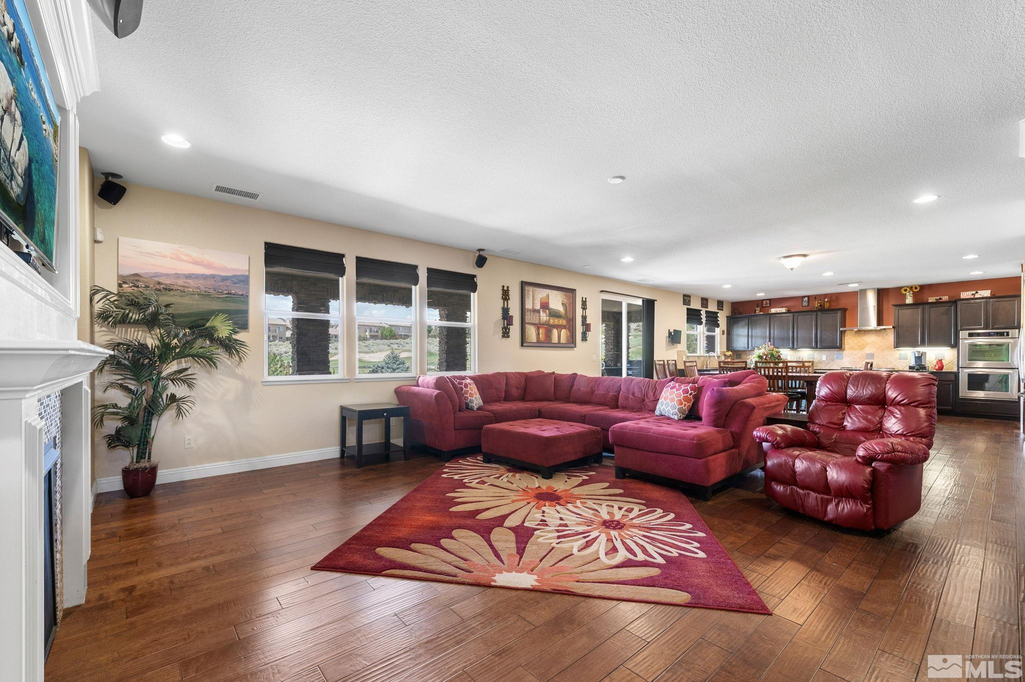 2055 Back Nine Trail Reno, NV 89523 - Photo 6 of 40 a living room with furniture and a fireplace