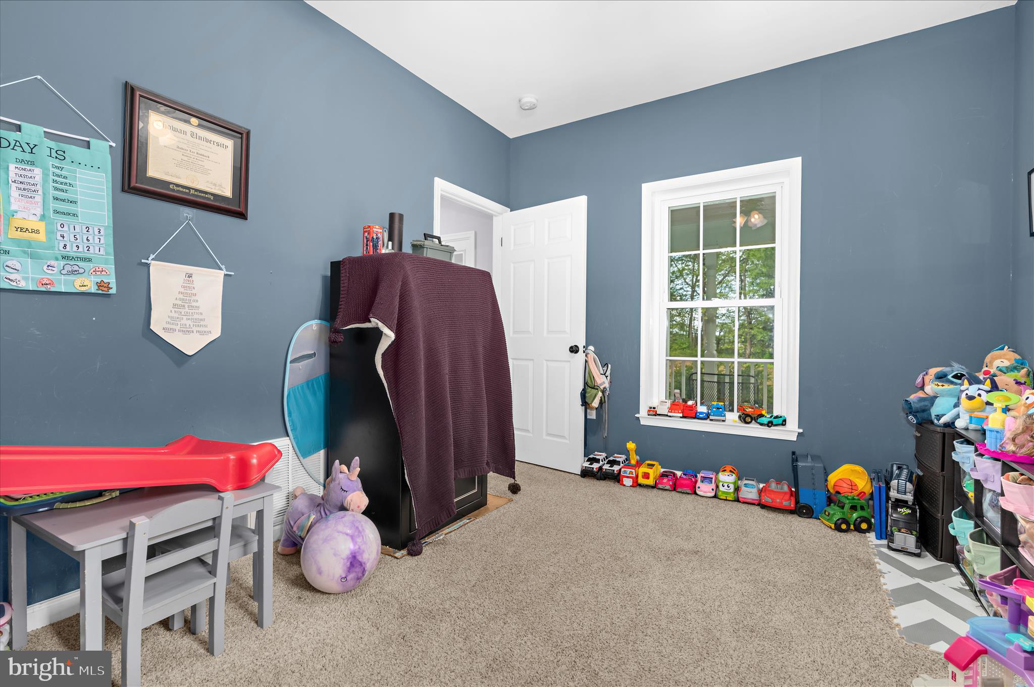 6941 Hubbard Road Hurlock, MD 21643 - Photo 18 of 71 a room with toys and a wooden floor