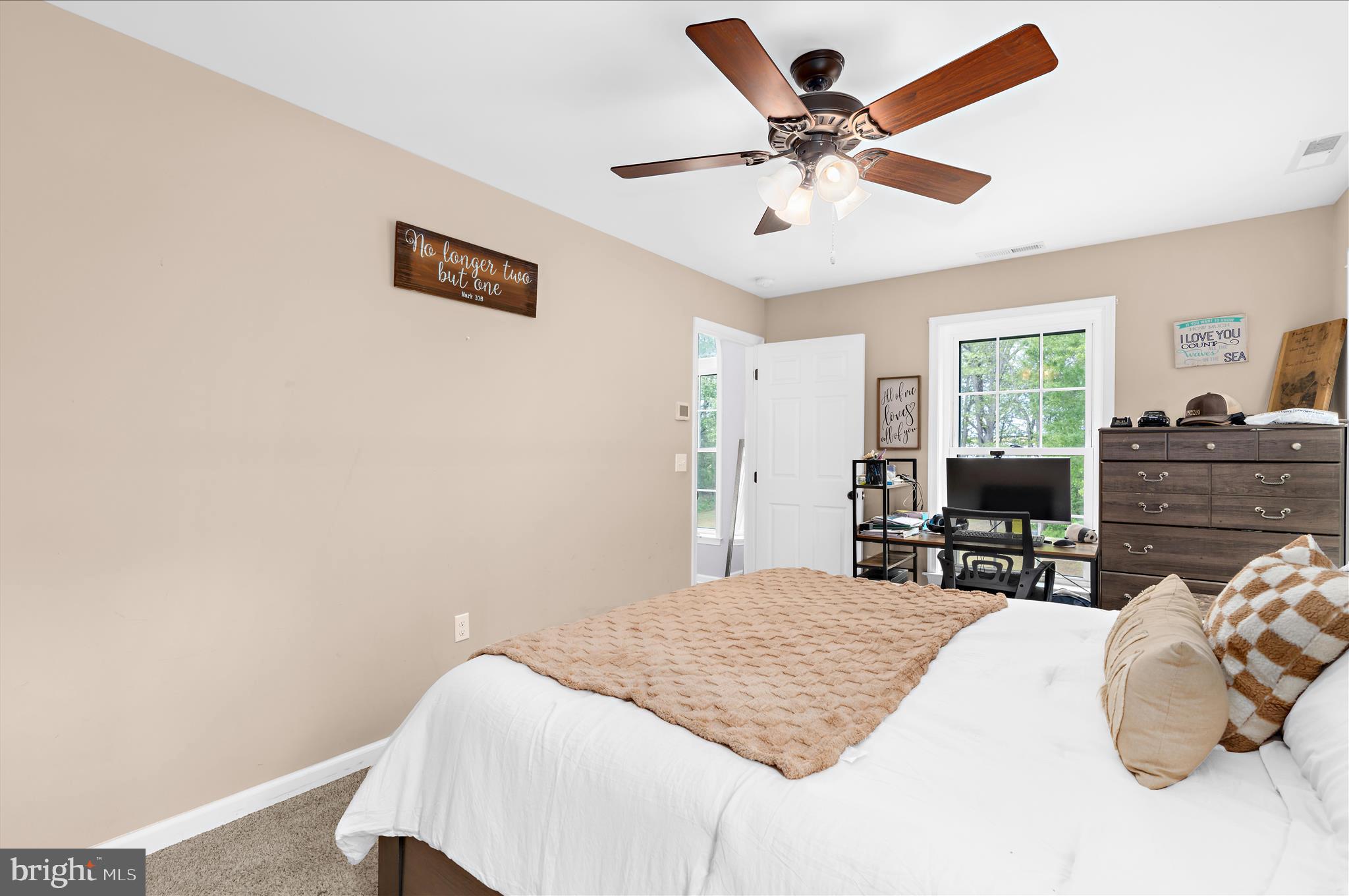 6941 Hubbard Road Hurlock, MD 21643 - Photo 30 of 71 a bedroom with a bed and furniture
