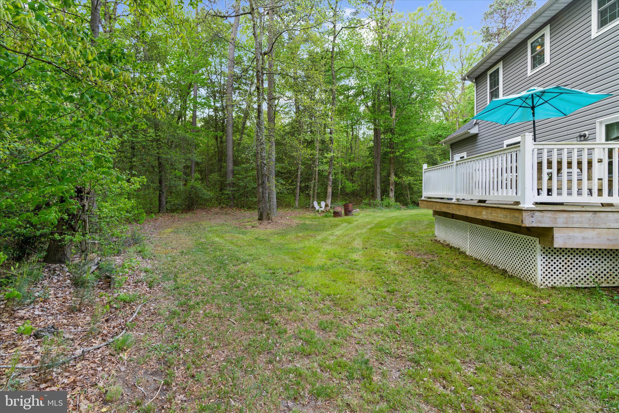 6941 Hubbard Road Hurlock, MD 21643 - Photo 36 of 71 a view of a house with backyard and sitting area
