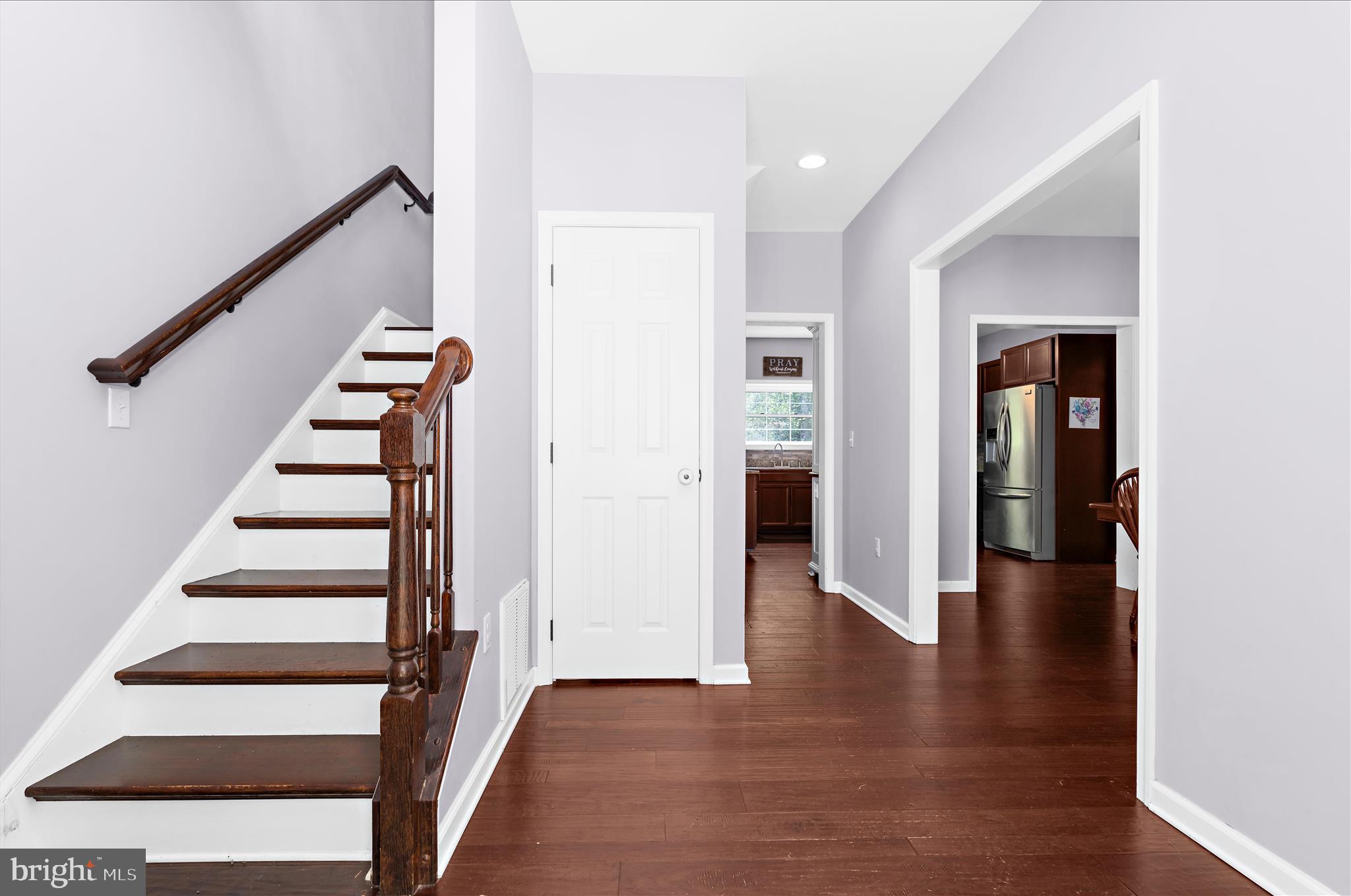 6941 Hubbard Road Hurlock, MD 21643 - Photo 5 of 71 a view of entryway with wooden floor and stairs