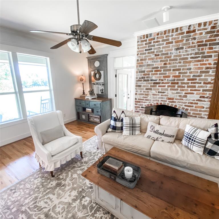 581 Country Club Road Fairview, TX 75069 - Photo 15 of 39 a living room with furniture and a large window