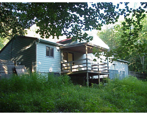 419 Town Farm Road Warren, MA 01092 - Photo 3 of 3 a view of a house with backyard sitting area and garden