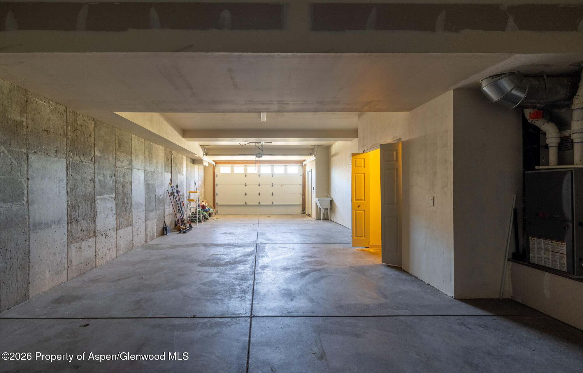 2016 Ballard Avenue Silt, CO 81652 - Photo 22 of 23 a view of a hallway with wooden shelves