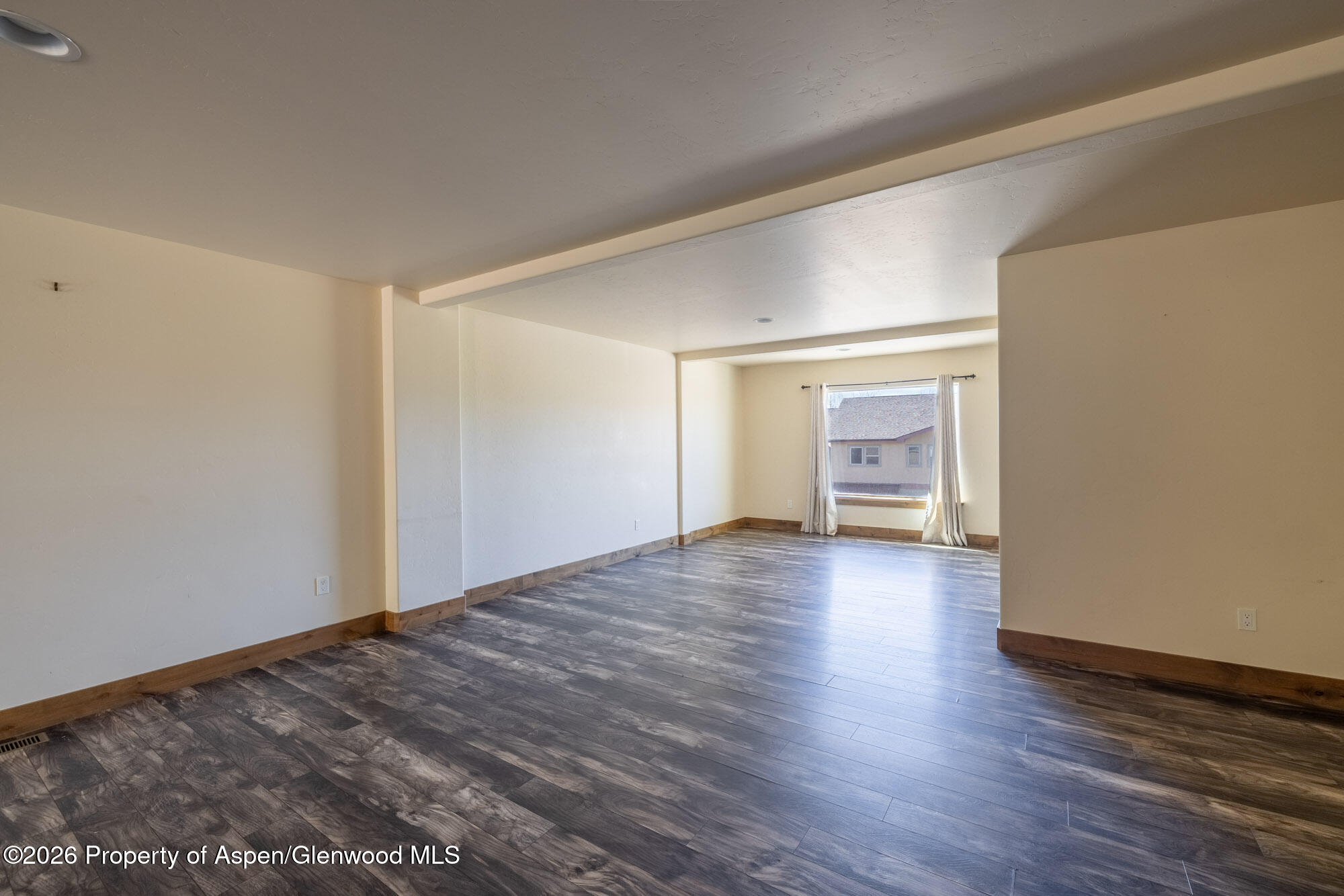 2016 Ballard Avenue Silt, CO 81652 - Photo 7 of 23 a view of empty room with wooden floor