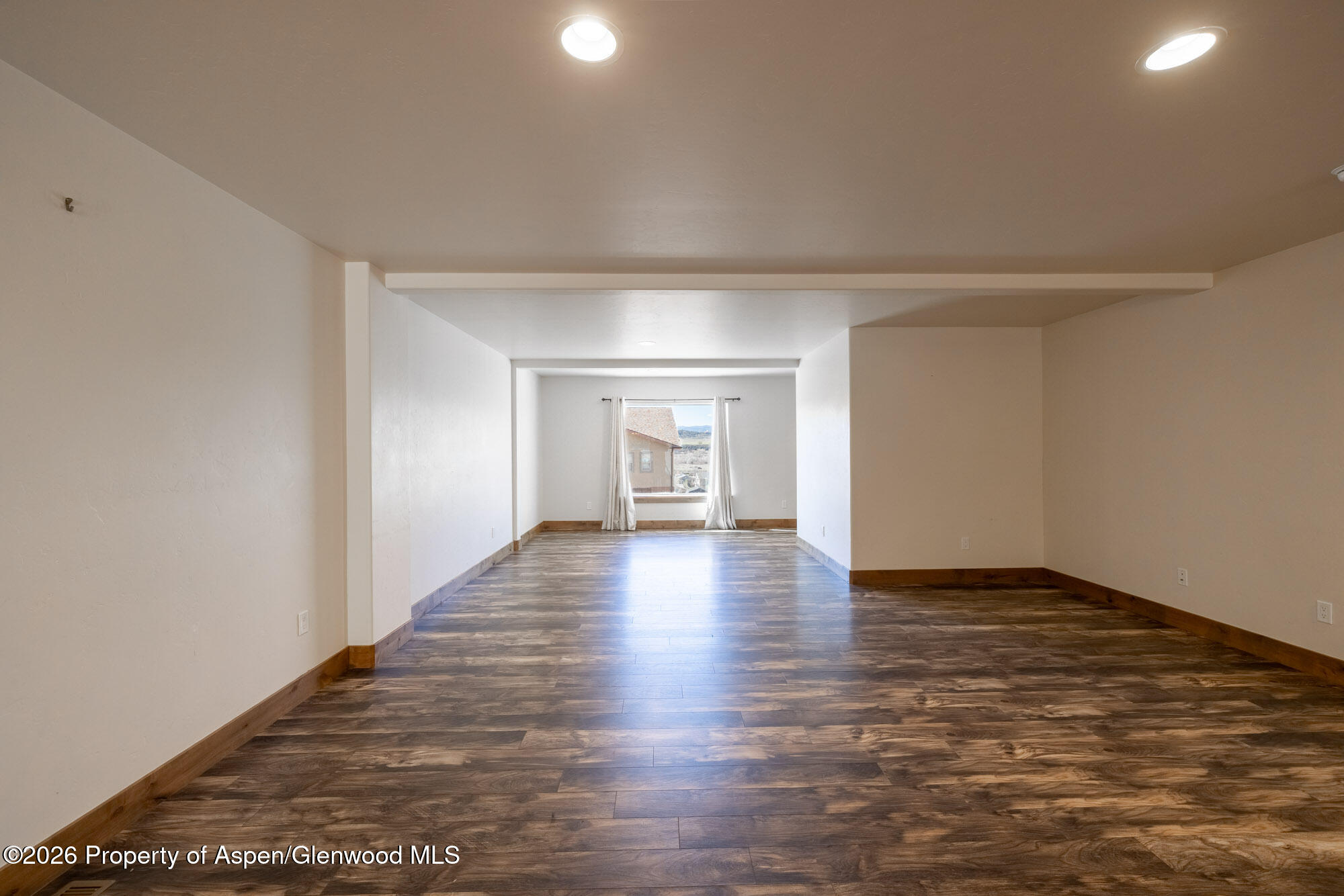 2016 Ballard Avenue Silt, CO 81652 - Photo 8 of 23 a view of an empty room and wooden floor