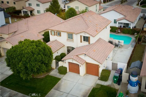 a aerial view of a house with garden