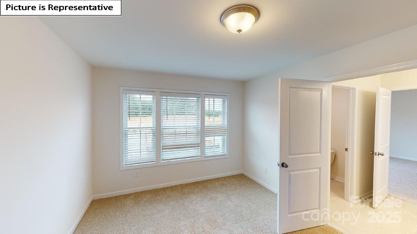 6136 Sylvan Drive Denver, NC 28037 - Photo 26 of 45 a view of an empty room with a window