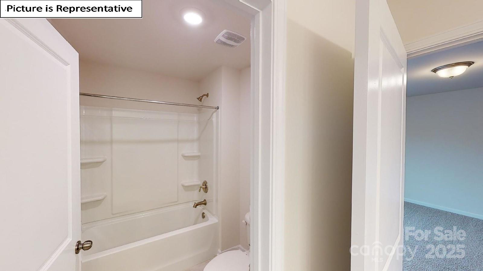 6136 Sylvan Drive Denver, NC 28037 - Photo 28 of 45 a bathroom with a bathtub