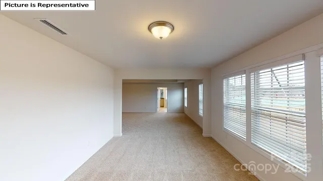 a view of a livingroom with a staircase
