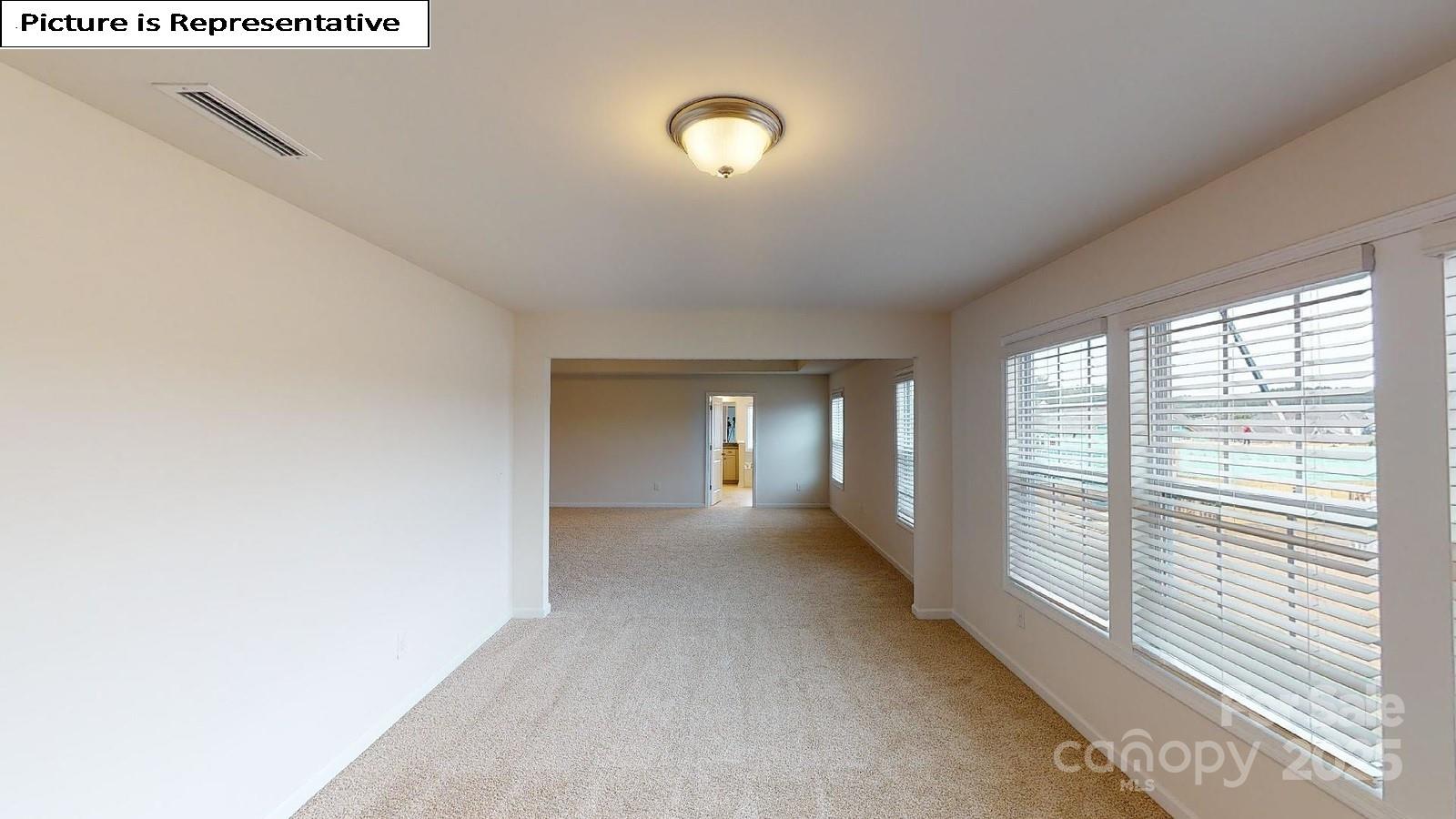 6136 Sylvan Drive Denver, NC 28037 - Photo 34 of 45 a view of a livingroom with a staircase