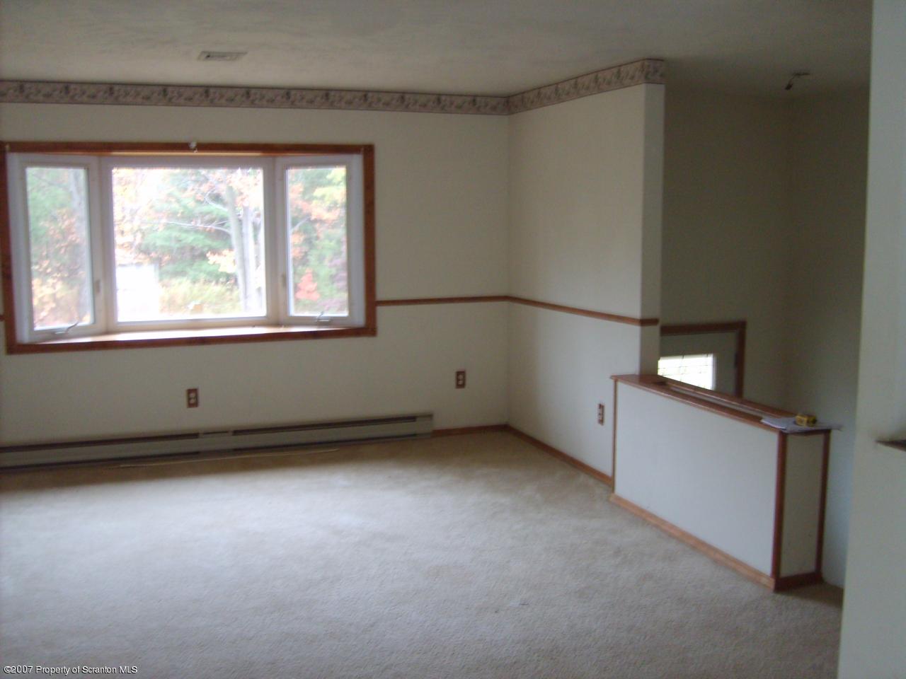 15 Pine Ridge Road Tunkhannock, PA 18657 - Photo 4 of 11 an empty room with a window