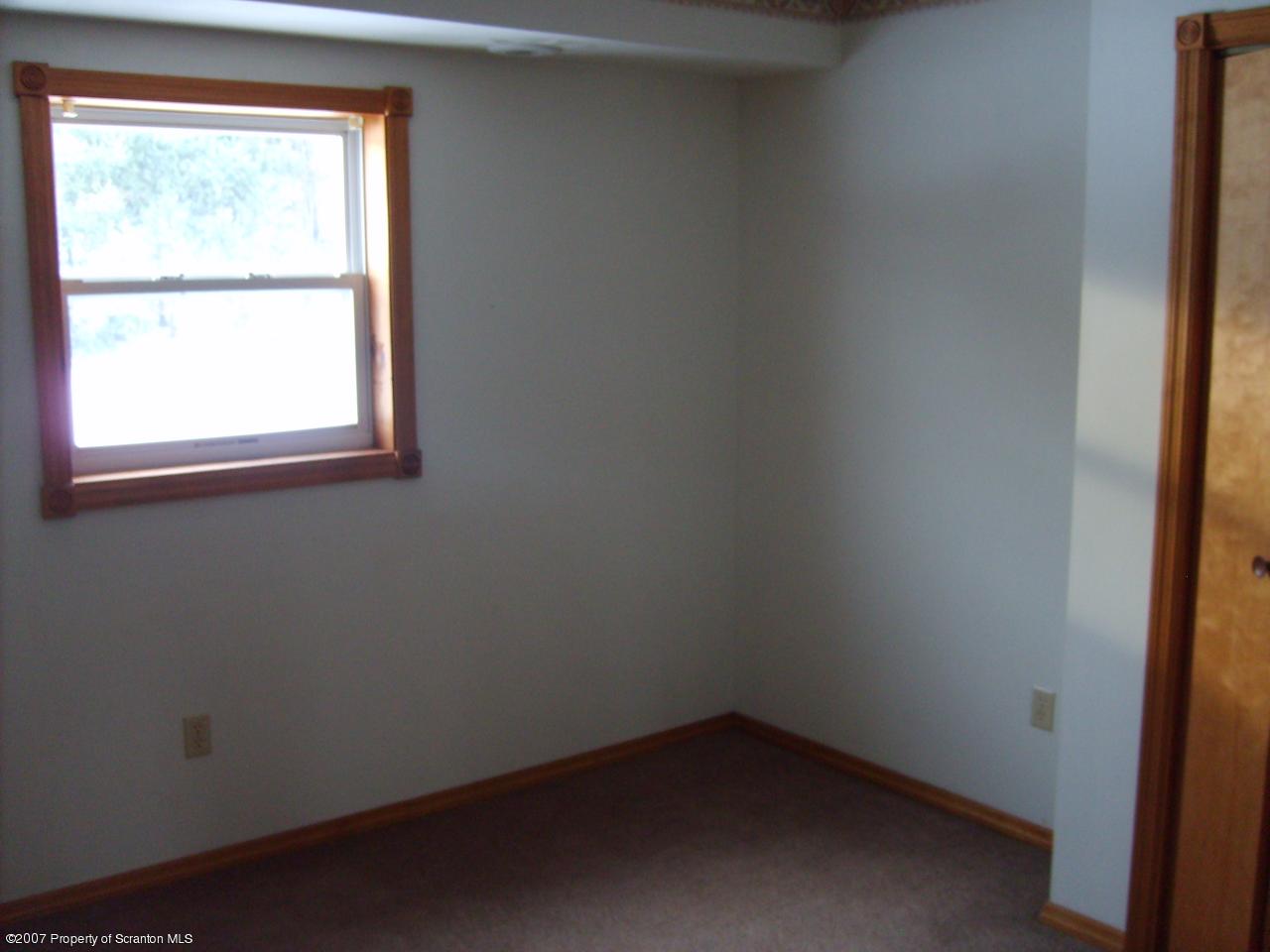15 Pine Ridge Road Tunkhannock, PA 18657 - Photo 10 of 11 an empty room with a window