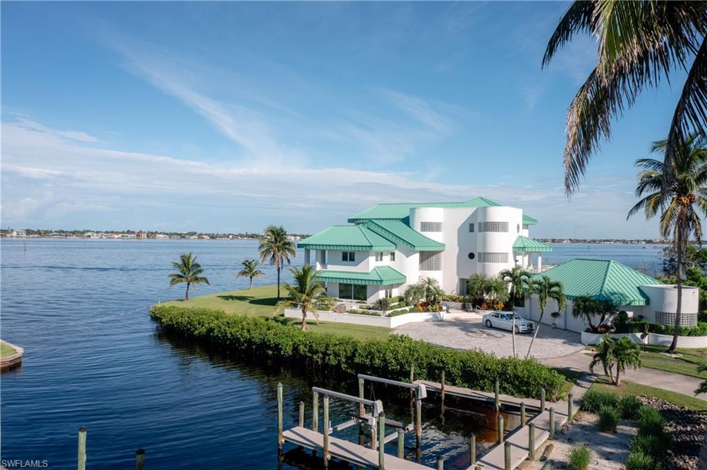 14040 Schultz Road Fort Myers, FL 33908 - Photo 39 of 48 Water view with boat lift and a dock