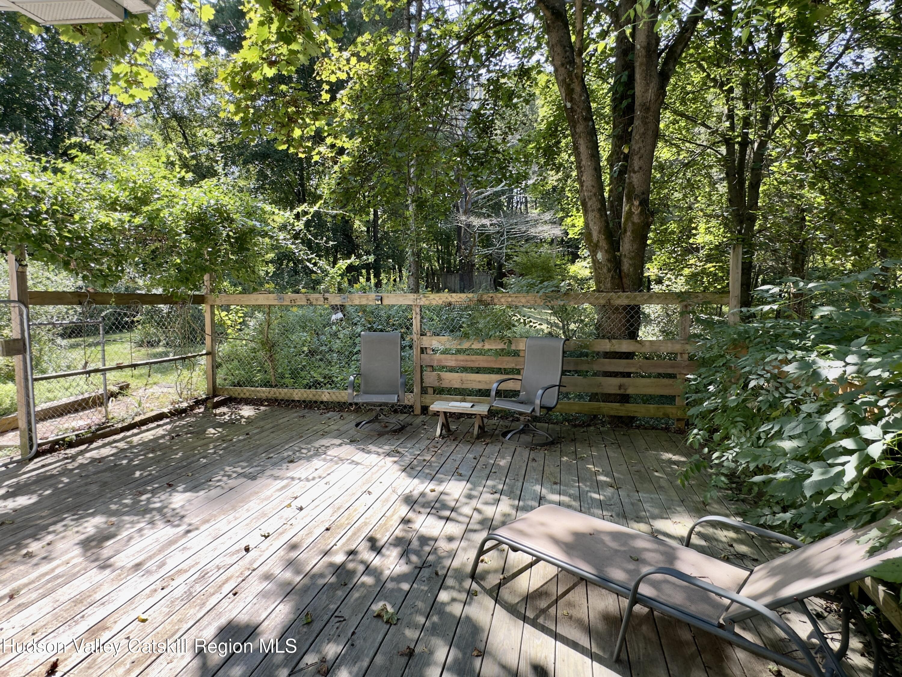 197 Old Rte 32 Saugerties, NY 12477 - Photo 23 of 31 a backyard of a house with lots of green space and fountain in the back