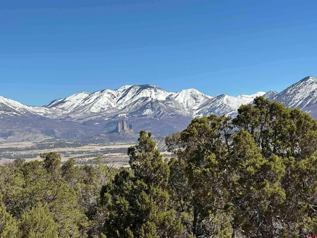 a view of a house with a mountain