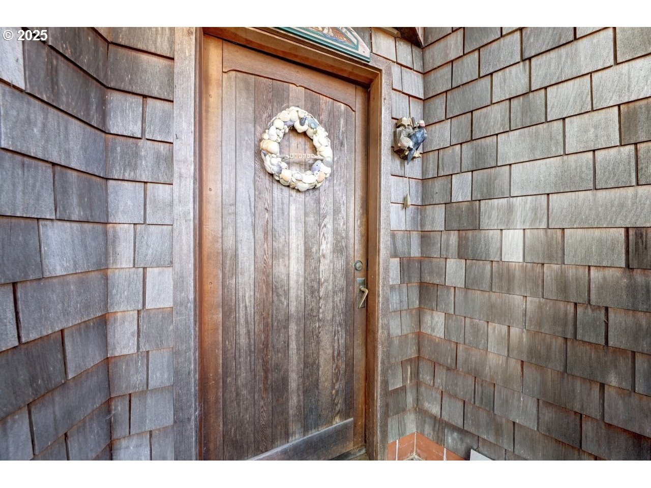 123 West 1st Street Cannon Beach, OR 97110 - Photo 3 of 35 a bathroom with a shower and a sink