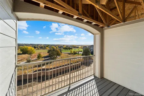 a view of a balcony with an outdoor space