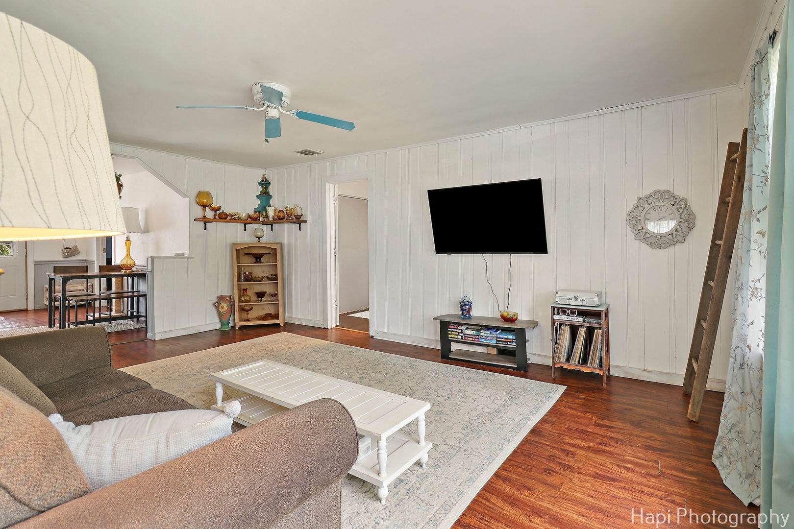 85 Bay Road Fox Lake, IL 60020 - Photo 3 of 22 a living room with furniture and a flat screen tv