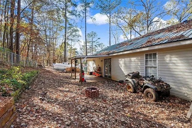 a view of a parked car in front of a house