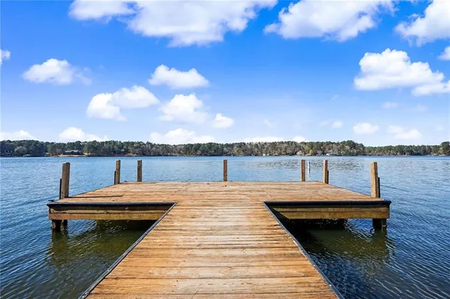 a view of sitting area with furniture and city view