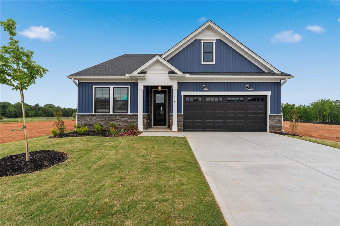 310 Bluestem Court Anderson, SC 29621 - Photo 1 of 36 This charming home offers modern curb appeal with a welcoming entryway and an attached garage.
