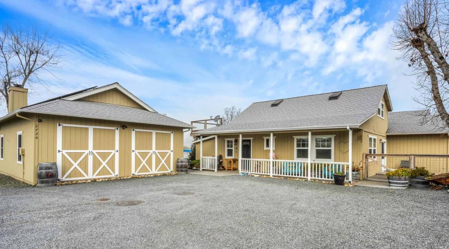 a front view of a house with a garage