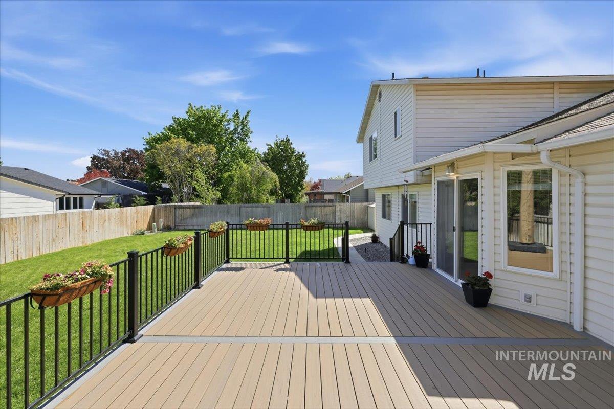 1128 West State Street Meridian, ID 83642 - Photo 46 of 50 Expansive composite deck featuring black metal railings