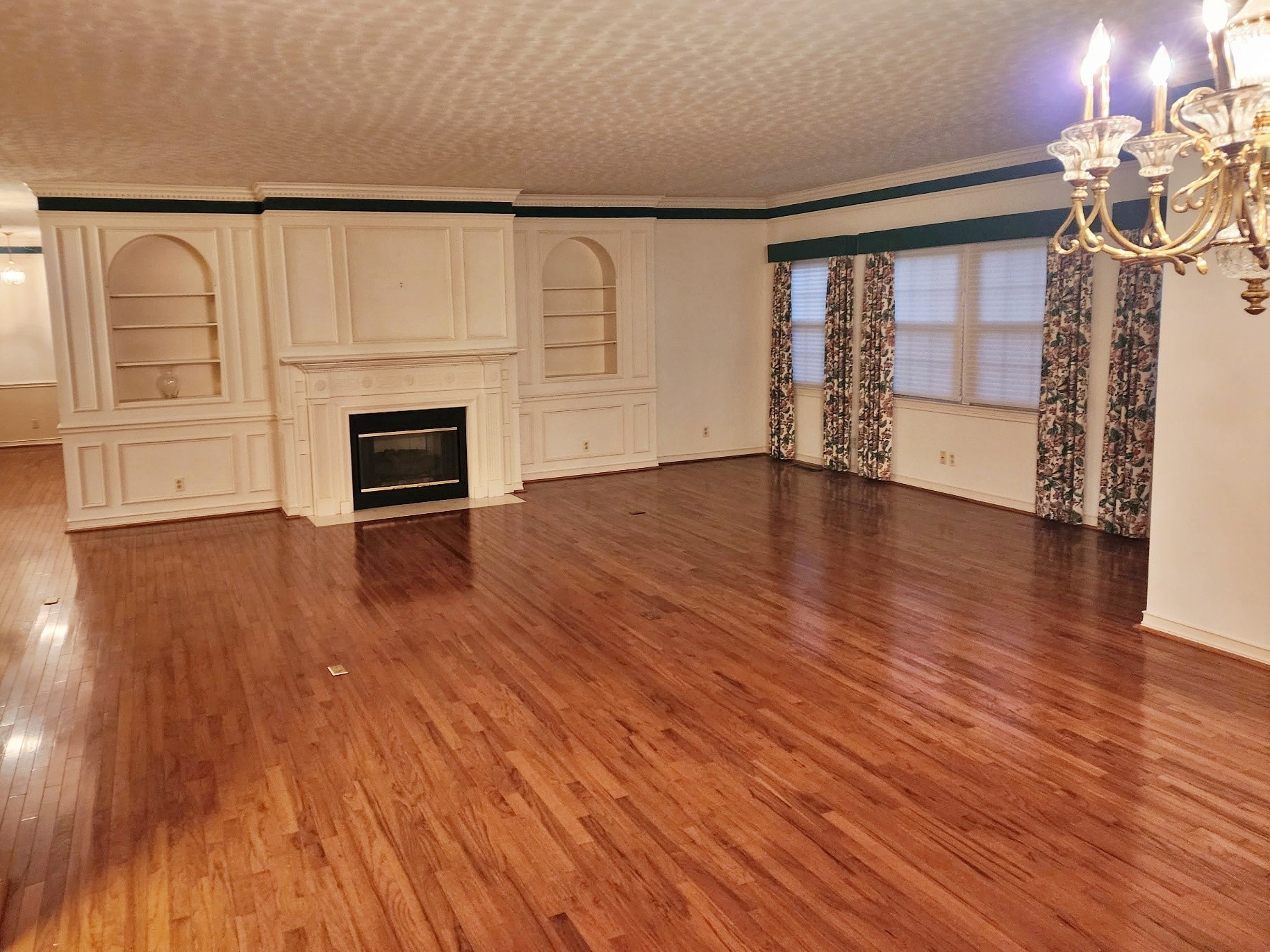 407 Tivoli Trail Springfield, TN 37172 - Photo 7 of 21 a view of empty room with wooden floor and fan