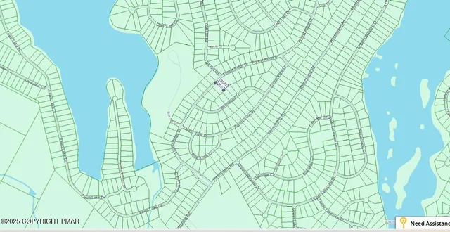 a bathroom with a shower curtain and a sink