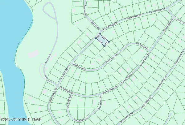 a room with a white wall and curtain