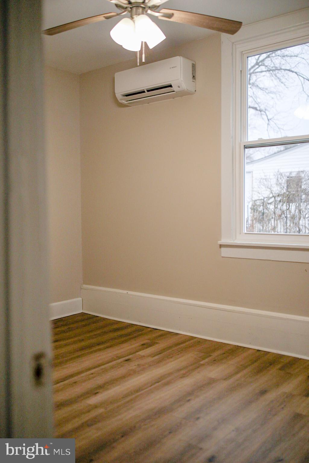 179 Main Street Hartly, DE 19953 - Photo 12 of 43 a view of a room with wooden floor and a window