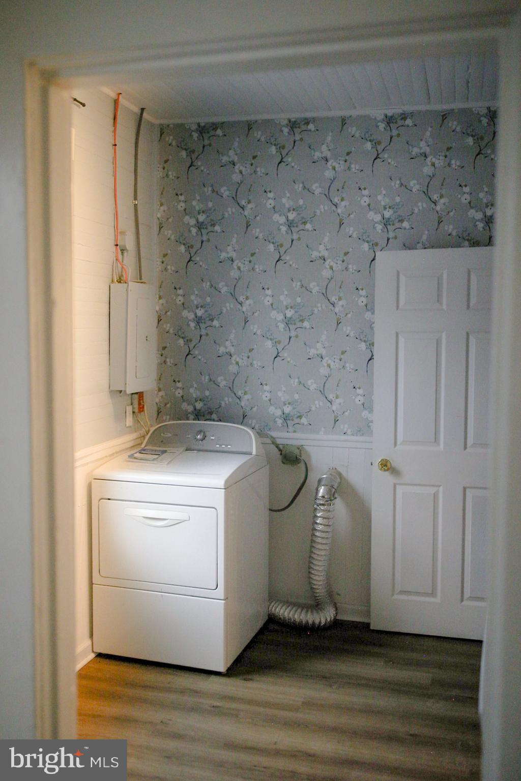 179 Main Street Hartly, DE 19953 - Photo 31 of 43 a view of a utility room with washer and dryer