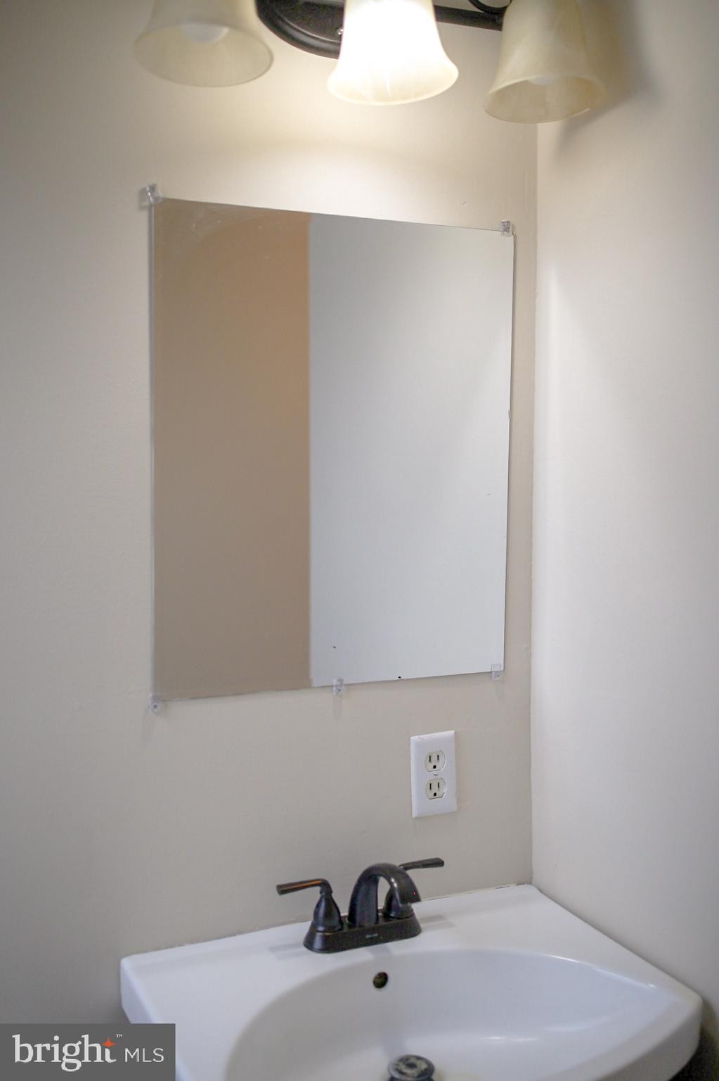 179 Main Street Hartly, DE 19953 - Photo 33 of 43 a bathroom with a sink and a vanity